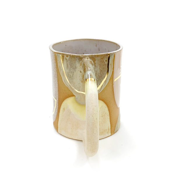 Tan and White Ceramic Mug With Golden Accents- Side