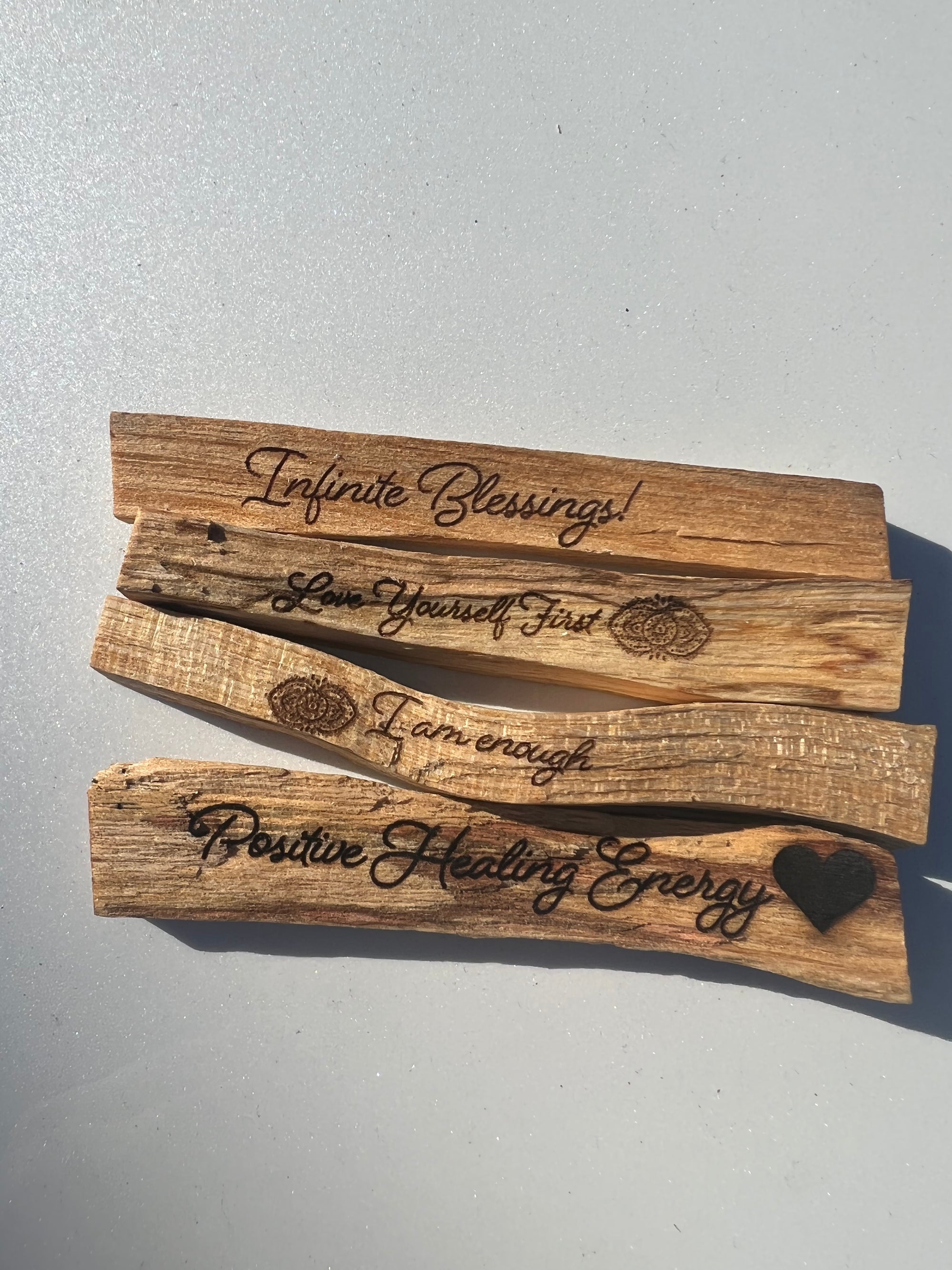 4 engraved Palo Santo Sticks